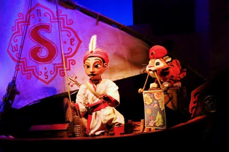 Sindbad and Chandu on a ship from Singbad's Storybook Voyage