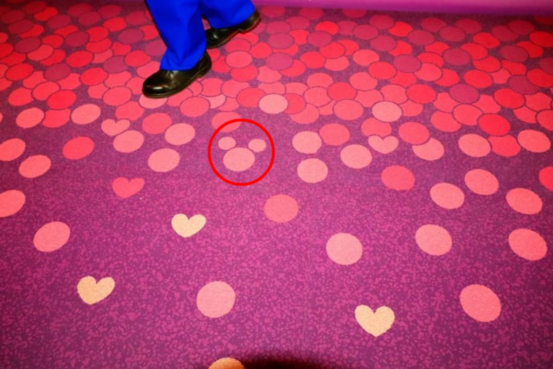 Hidden Mickey on the carpet at Minnies Style Studio